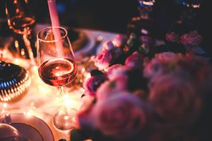Restaurant Table with Wine Glass and Flowers